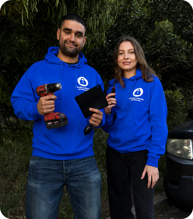 Friendly Locksmith and Security team beside their service vehicle